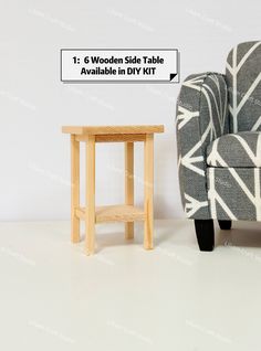 a small wooden table next to a gray and white chair with a sign that says 6 woodworking skills available in diy kit