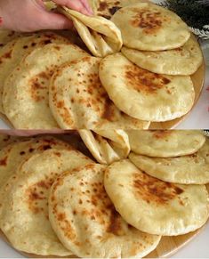 a plate filled with flat bread on top of a table