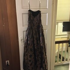 Brown And Black Floral Gown Size 8, But Runs Small More Like Size 6 Worn Once Great Condition Long Brown Floral Print Dress, Black Floral Gown, Fitted Brown Floor-length Maxi Dress, Brown Floral Print V-neck Maxi Dress, Brown Floral Print V-neck Dress, Full Length Gowns, Floral Gown, Size 8 Dress, Dresses Women