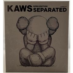 a book with an image of a stuffed animal on it's back and the title kaws separated