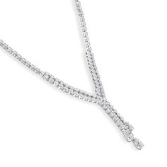 Drape your neck in sparkle and elegant detail when you wear this luxe diamond double-strand chandelier necklace. Created in 14K white gold Diamond-lined double-row ribbons meet in a triple-row "Y"-shaped drop. Pear-shaped diamond composites punctuate each ribbon. Diamonds sparkle in a single row further up the design. Stunning with 2-3/4 cts. t.w. of diamonds This 16.0-inch necklace secures with a box clasp. Formal Double Strand Diamond Necklace, White Gold Lariat Diamond Necklace For Formal Occasions, Formal White Gold Lariat Diamond Necklace, Formal Lariat Diamond Necklace In Fine Jewelry Style, Formal Lariat Diamond Necklace Fine Jewelry, Formal Lariat Diamond Necklace, Formal Lariat Diamond Necklace With Brilliant Cut, Formal Brilliant Cut Lariat Diamond Necklace, Elegant Double Strand Necklace For Anniversary