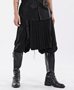 Dark Black Men's Pleats Wrap Skirt // Wear it with Drop Crotch Pants – Ofelya Boutique Black Pleated Skirt For Streetwear, Black Pleated Pants For Fall, Pleated Black Pants For Fall, Winter Black Bottoms With Pleated Skirt, Fitted Pleated Punk Bottoms, Pleated Fitted Punk Bottoms, Winter Black Pleated Skort Bottoms, Winter Black Pleated Skirt Bottoms, Pleated Tight-fitting Punk Bottoms