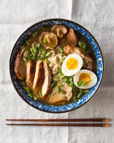 a bowl of ramen with an egg and mushrooms