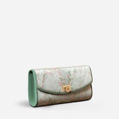 Elevate your style with our Song Brocade Color-Woven Silk Clutch Bag. Perfect for special occasions, this luxurious bag features a unique ru yi lock clasp and versatile carrying options. Enjoy a spacious interior for your essentials while celebrating culture and craftsmanship in every detail. Elegant Everyday Envelope Bag, Elegant Envelope Bag, Elegant Envelope Shoulder Bag For Daily Use, Luxury Handheld Clutch For Daily Use, Luxury Evening Bag With Removable Pouch Gift, Luxury Evening Bag With Removable Pouch As Gift, Luxury Envelope Bag For Formal Occasions, Formal Envelope Bag With Dust Bag Included, Luxury Formal Envelope Bag