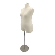 a white female mannequin on a metal stand