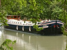 a large boat floating on top of a river