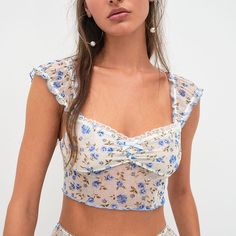 For Love And Lemons Lottie Top Blue White Floral Xl New Condition: New In Package Size: Xl Color: Blue/White Floral Delicate Calico Florals Mingle Femininity And Romance. Lined Cups Add Comfort Alongside A Sweet Ruffle Trim. Shearing Accent Lined Lettuce Edge Hem Lace Trim Lettuce Edge Cap Sleeves Machine Wash Imported White Blouse Crop Top, Lace Bustier Top, White Lace Crop Top, Lemon Top, Backless Crop Top, Crop Top Shirts, For Love & Lemons, Crop Top Sweater, Love And Lemons