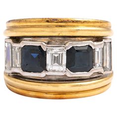 Vasari Sapphire Diamond Gold 18K Ring. Signed Vasari. Can be polished upon request. Sapphire weight: approximately estimated 0.60-0.80 carat each. Diamond total weight: approximately estimated 1.00 carat. Total weight: 13.84 grams. Size: 52 / 6 US. Luxury Yellow Gold Sapphire Ring With Diamond Cut, Luxury Multi-stone Sapphire Baguette Cut Ring, Luxury Yellow Gold Sapphire Ring With Vvs Clarity, Luxury Yellow Gold Sapphire Ring In Platinum, Luxury Platinum Sapphire Ring In Yellow Gold, Formal Multi-stone Sapphire Ring In Yellow Gold, Timeless Yellow Gold Multi-stone Sapphire Ring, Timeless Multi-stone Yellow Gold Sapphire Ring, Luxury Yellow Gold Emerald Cut Sapphire Ring