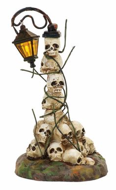 a lamp that has skulls on it