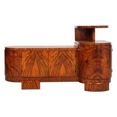 an art deco sideboard with two drawers and one door on the top, inlaid with wood veneers