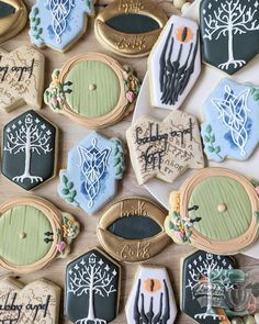 decorated cookies are displayed on a table