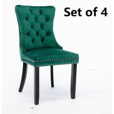 a set of 4 green velvet dining chairs with studded trimmings on each side