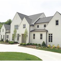 a large white house with lots of windows