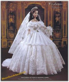 the doll is wearing a wedding dress and veil