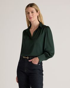 A cross between a classic polo and a feminine blouse, this softly ruched pullover is a fresh spin on the silk shirt. Crafted from premium mulberry silk with a hint of stretch, our Washable Stretch Silk Split Neck Blouse feels incredibly soft and silky to the touch but is incredibly easy to care for. With a gorgeous drape and relaxed cut, it's sure to be your new go-to.  | Quince | Women's Washable Stretch Silk Split Neck Blouse in Forest Green, Size XS, Mulberry Silk Thai Silk Blouse, Quince Green, Quince Tops, Green Silk Shirt, Green Silk Blouse, Red Silk Blouse, Office Clothing, Silk Clothes, Feminine Blouses