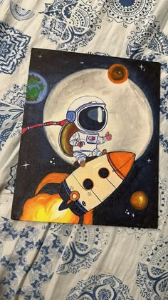 a painting of an astronaut on top of a rocket ship