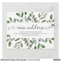 an elegant greenery wedding address card