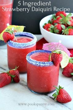 strawberry daiquita margaritas with strawberries on the side