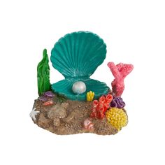 an ocean scene with seashells, starfish and other sea creatures on a rock