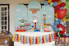 a birthday party with balloons and decorations