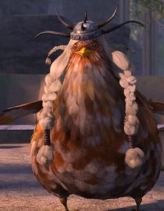 a large bird with horns and braids on it's head