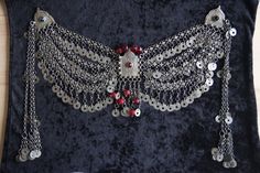 In the Ottoman period, women wore silver jewelry over their fez hats. This product original Ottoman Fez hat jewelry with natural red stones. It is handmade. Elegant Red Ceremonial Headpieces, Turkish Jewelry Ottoman, Handmade Bohemian Silver Headpiece, Handmade Red Festival Headpieces, Red Handmade Festival Headpieces, Handmade Red Headpieces For Festivals, Elegant Silver Necklace For Traditional Ceremonies, Handmade Silver Ceremonial Headpiece, Handmade Silver Headpieces For Ceremonial Occasions