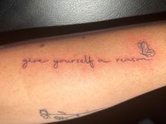 a tattoo with the words give yourself a reason on it