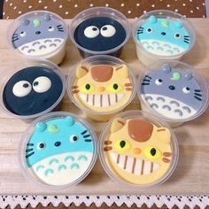 the cupcakes are decorated like animals and have different designs on them, as well as eyes