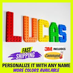 the word lucas is spelled with legos and stickers to spell out their name