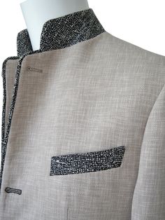 Sebastian Cruz Couture Exclusive Fabric Woven In Italy Avena Lino Fabric SCC Signature Mandani Colar Fully Lined with exclusive lining for light weight feel Soft, natural shoulder construction Chest Barchetta Pocket Dual Vents Dinner Jacket Pockets Nero Horn With Silver Rim Buttons Contrasting Tweed Fabric Accents Make sure to select your FREE Sebastian Cruz Couture Pocket Square at checkout! All of our jackets are made with 4" extra of fabric to ensure you don't have to send it back to us if it's too small or too big. You can tailor your jacket 2 sizes bigger and/or smaller if needed. We guarantee your satisfaction! Fabric Details: CO 72% PL 15% PO 7% AF 4% PL 2% Designer Fitted Beige Nehru Jacket, Elegant Beige Nehru Jacket With Long Sleeves, Beige Stand Collar Blazer, Beige Long Sleeve Nehru Jacket For Formal Occasions, Cream Fitted Nehru Jacket For Semi-formal Occasions, Beige Fitted Long Sleeve Bandhgala, Fitted Beige Long Sleeve Bandhgala, Fitted Long Sleeve Beige Bandhgala, Lino Fabric