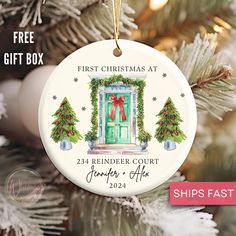 a personalized christmas ornament hanging on a tree with the words, first christmas at