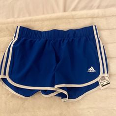 New With Tags. Bright Blue Adidas Running Shorts With 3” Inseam. Super Comfortable And Made Of A Lightweight Material Which Makes Them Great For Working Out Or Lounging. The Last Image Is A Stock Photo Of The Same Shorts In A Different Color Way. Adidas Blue Workout Shorts, Adidas Blue Athleisure Athletic Shorts, Casual Adidas Blue Athletic Shorts, Casual Blue Adidas Athletic Shorts, Casual Adidas Blue Shorts, Casual Blue Adidas Shorts, Adidas Blue Shorts For Summer, Adidas Blue Workout Bottoms, Adidas Blue Shorts