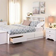 a white bed with drawers underneath it and the caption reads 5 in fact, invest in furniture that can serve multiple purposess