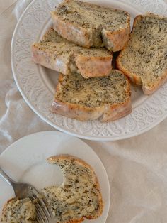 slices of bread on a plate with a fork