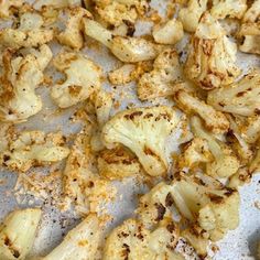 roasted cauliflower florets on a baking sheet