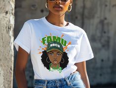 Link to matching sweatshirts - https://www.etsy.com/listing/1755953066/famu-lady-hbcu-florida-state-university Crafted from soft and comfortable fabric, this tee is designed for ultimate comfort and style. The striking graphic design showcases the FAMU Lady, making it the perfect addition to your game day outfit or everyday wardrobe. With this shirt, you'll stand out in the crowd and show your pride for this illustrious university. Wear it to sports events, tailgate parties, or simply when you w Alcorn State University, Graphic Design Showcase, Tailgate Parties, University Girl, Southern Ladies, Game Day Outfit, Matching Sweatshirts, Florida State University, Gameday Outfit