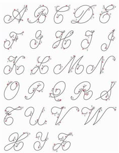 the upper and lowercase letters are handwritten in cursive handwriting with red dots