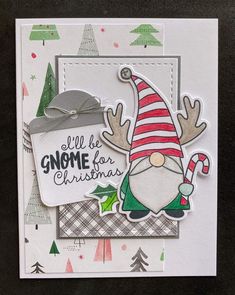 a christmas card with an image of a gnome