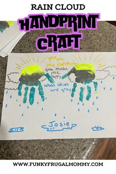 handprint craft for kids with rain clouds and two hands