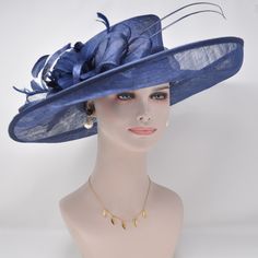 "Description: This beautiful sinamay hat is an elegant wear at any church or derby event. its sinamay material is not too intimidating and attracts the eye. The chic flower adnorment that rests on the wide, side sweep brim is complemented by sinamay accentuations. Material: Sinamay with feathers Crown Width; 8 inch Crown Height: 4 inch Brim Width: 7 ~ 5 inch Head girth is from 22' to 23.5 \" adjustable size fits most with an adjustable cord strap for the smaller fit Color on screen may vary from Ascot Horse Racing, Oaks Day, Feather Crown, Sinamay Hat, Elegant Wear, Royal Ascot Hats, Sinamay Hats, Ascot Hats, Tea Party Wedding