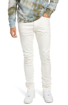 Crisp white Japanese-denim jeans are cut in a skinny fit with a hint of stretch that allows you to move freely and comfortably in these five-pocket jeans. 32 1/2" inseam; 13" leg opening; 10 1/2" front rise; 14" back rise (size 32) Zip fly with button closure Five-pocket style 98% cotton, 2% polyurethane Machine wash, line dry Made in Japan Men's Clothing White Stretch Denim Jeans, Slim Fit White Denim Bottoms, White Slim Fit Denim Bottoms, White Five-pocket Jeans For Everyday, Classic White Stretch Jeans, Casual Fitted White Jeans, White Everyday Jeans With Five Pockets, White Jeans For Everyday Wear, Everyday White Jeans