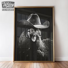 a black and white photo of a chicken wearing a cowboy hat