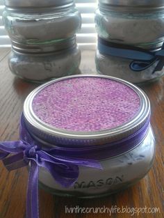 homemade diy baking soda air freshener jars in mason jar with purple ribbon on top