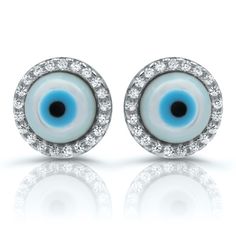 "These protective evil eye earrings are crafted of sterling silver, rhodium plated and stamped with 925 quality mark. The earrings feature a gleaming Mother of Pearl round stone surrounded by brilliant cut flawless cubic zirconia stones in a halo setting. Worn as charms, these earrings are believed to ward off bad luck & maladies caused by the \"Evil Eye\". A simply must-have to add to your collection of anti evil eye jewelry. Shimmering and stylish, these smal post stud earrings are great f Evil Eye Earrings, Halo Setting, Bad Luck, Earrings Pearl, Cz Stud Earrings, Eye Earrings, Evil Eye Jewelry, Eye Jewelry, Earrings Sterling Silver