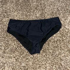 Never Worn Black Bikini Bottoms Black Stretch Bottoms For Poolside, Black Beachwear Bottoms For Pool, Black Seamless Beach Bottoms, Seamless Black Beach Bottoms, Black Brief Bottoms For Beach, Black Seamless Swimwear For Sunbathing, Black Seamless Tankini For Sunbathing, Black Bottoms For Sunbathing Beach Season, Black Seamless Bottoms For Beach Season