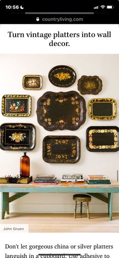 a table with many trays on it in front of a wall that says turn vintage plates into wall decor don't let gorgeous china or silver plates