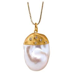 Large, 64ct Baroque Pearl Pendant Necklace with Diamonds, 24kt Solid Gold by Prehistoric Works of Istanbul, Turkey. Diamonds - 0.06cts. Measures 21.5mm x 33.3mm. Wears well with 22" or 30" chain. Please contact the gallery directly to edit the listing and add chain. Pearl Pendant Necklace, Baroque Pearls, Pearl Pendant, Istanbul, Solid Gold, Jewelry Necklace Pendant, Jewelry Necklaces, Pendant Necklace, Chain