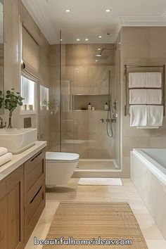 a bathroom with a tub, toilet and sink