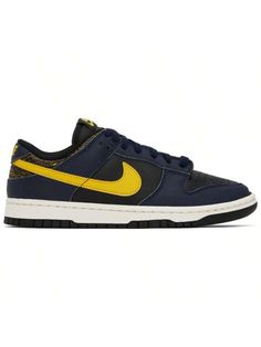 Nike 
Black & Navy Dunk Low Retro Sneakers 
Low-top paneled grained leather sneakers in black and navy. 
. Perforated detailing at toe 
. Lace-up closure 
. Logo patch at padded tongue 
. Padded collar 
. Swoosh appliqué at sides 
. Logo embroidered at heel collar 
. Crackled leather at heel counter 
. Mesh lining 
. Treaded rubber sole 
Please note that this item may be shipped only within North America. 
Supplier color: Black/Tour yellow 
Upper: leather. Sole: rubber. 
Made in Viet Nam. 
24101 Navy Lace-up High-top Sneakers For Streetwear, Navy Low-top Custom Sneakers With Rubber Sole, Casual Navy Sneakers With Contrast Sole, Sporty Navy Sneakers For Skateboarding, Low-top Sneakers With Rubber Waffle Outsoles For Streetwear, Sporty Low-top Skate Shoes With Rubber Waffle Outsoles, Sporty Navy Low-top Skate Shoes, Urban Low-top Basketball Shoes With Contrast Sole, Casual Navy Basketball Shoes With Rubber Sole