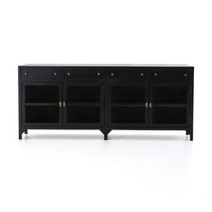 the sideboard is black and has brass knobs on each door, and two drawers